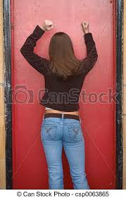 woman banging on door